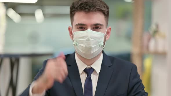 Young Businessman with Protective Face Mask Showing Thumbs Up 