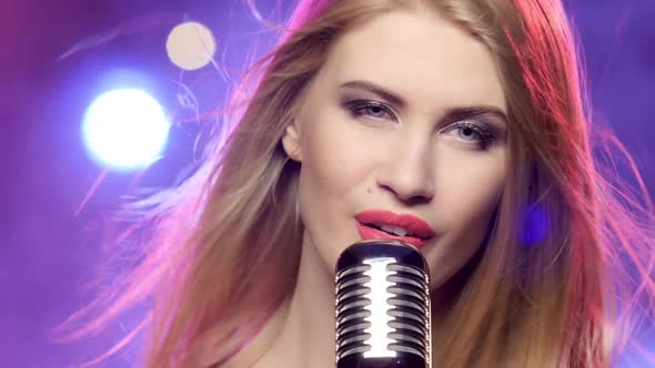 Glamour Singer Girl with Retro Microphone Long Blonde Hair Developing