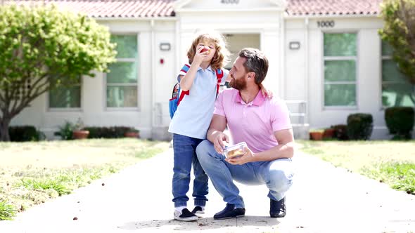 Happy Father and Son Eating Lunch After School Slow Motion Fatherhood