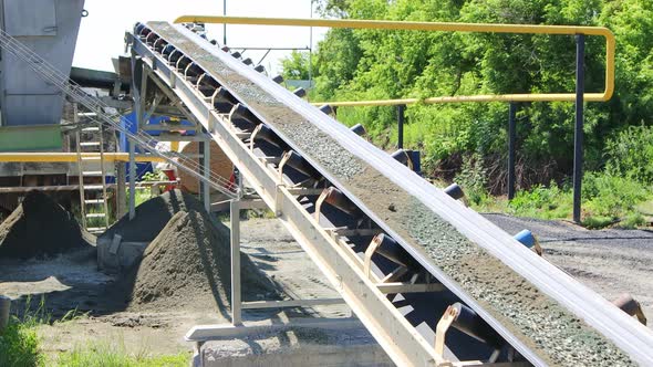 Transportation of Crushed Stone and Sand on a Conveyor Belt