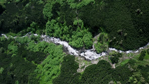 Aerial View Of A Plateau Waterfall High Mountain Range Surrounding