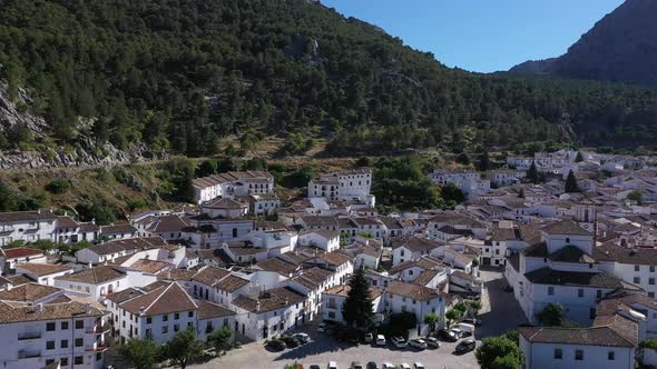 AERIAL - The village of Grazalema in Cadiz, Andalusia, Spain, wide shot rising