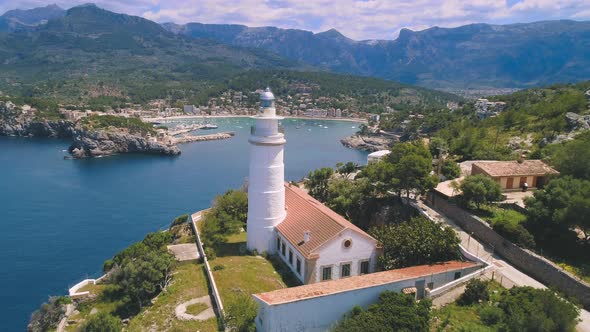 Picturesque mountainous seashore with lighthouse