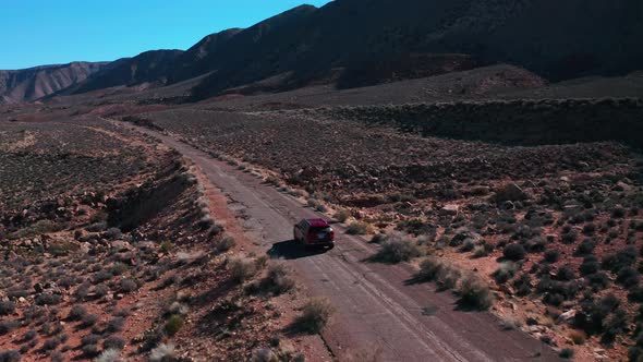 Red car in the desert 