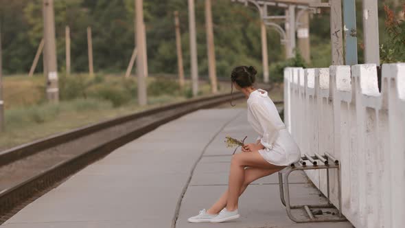 Young Woman on Train Station