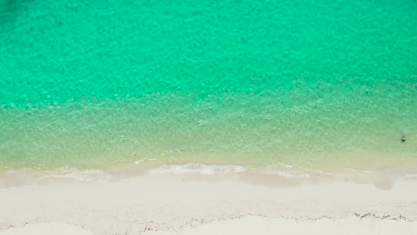 Tropical Beach and Blue Sea with Waves