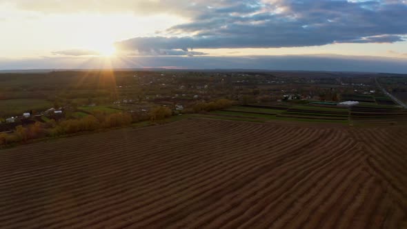 Flying Over an Green Empty Field