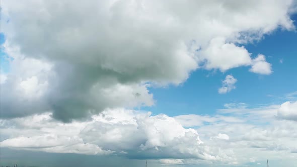 Time-Lapse: Oncoming White Cumulus Clouds