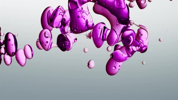 colorful purple,  pink, violet oil fluid shapes in purified water on a white gradient background. vi