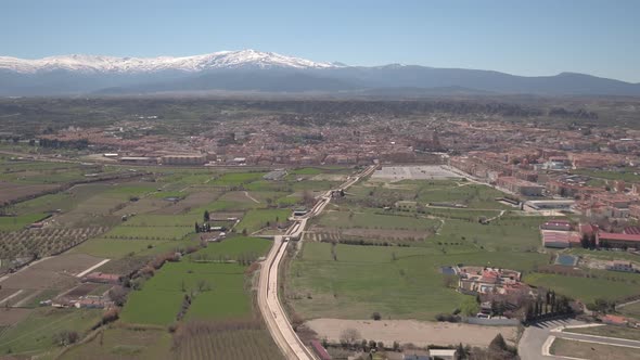 Aerial shot of Guadix and Sierra Nevada mountains alt