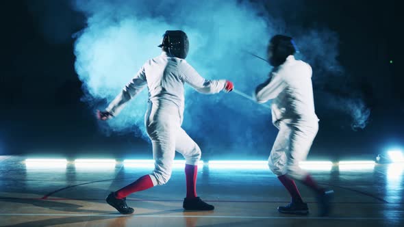 Sportsmen Are Having a Fencing Training