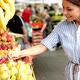 Picture of Woman at Marketplace Buying Fruits - VideoHive Item for Sale