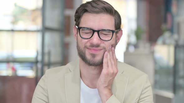 Young Man Having Toothache Cavity