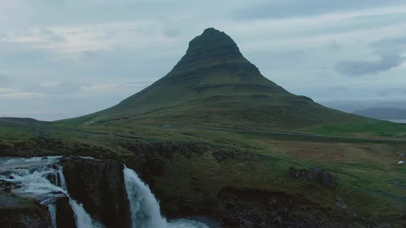 Kirkjufell Mountain and Kirkjufellsfoss Waterfall in Summer. Iceland