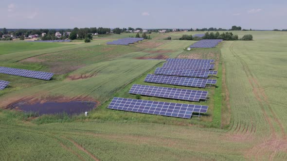 Ecology solar power station panels in the fields green energy at sunset landscape electrical innovat