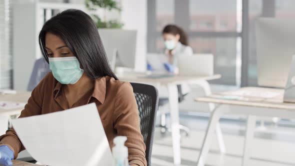 Tracking video of working in an office during a pandemic. Shot with RED helium camera in 8K