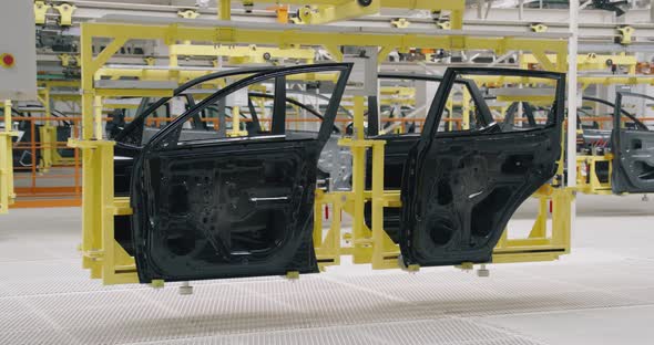 Automobile Plant Modern Production of Cars Transportation of Ready Car Doors on the Production Line