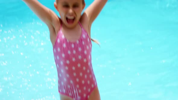 Girl enjoying in swimming pool