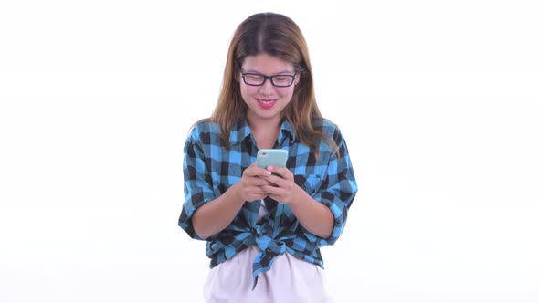 Happy Young Asian Hipster Woman Using Phone