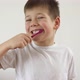 Kid Boy Brushing His Teeth Using Tooth Brush and Oral Paste Cleaning Teeth - VideoHive Item for Sale
