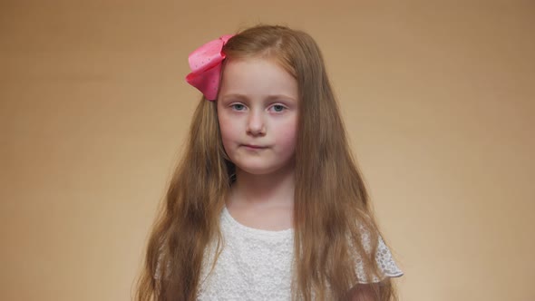 Portrait Of Serious Little Girl