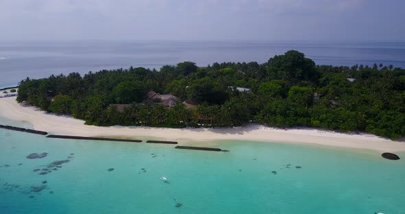 Tropical flying island view of a white sand paradise beach and turquoise sea background in colourful