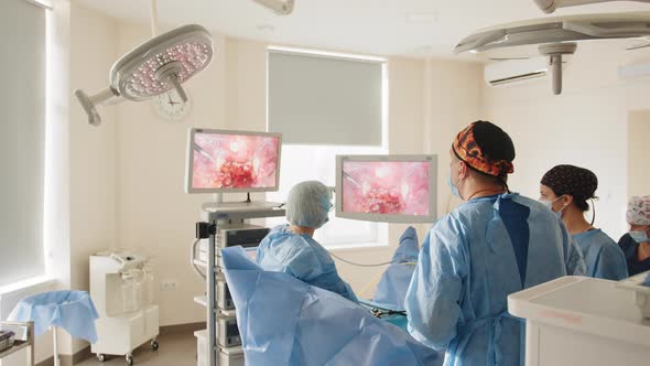 Laparoscopic Surgeon Looking at Monitor During Laparoscopic Surgery