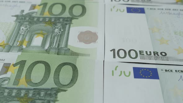 Strong European Union currency in hundred denominations close-up 4K 2160p 30fps UltraHD tilting foot