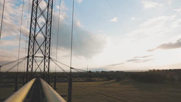 Walking On Narrow Suspension Bridge