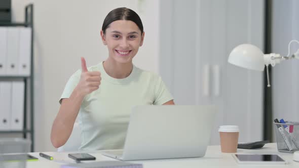 Young Latin Woman with Laptop Showing Thumbs UP 