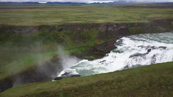 Gullfoss waterfalls in Iceland with drone video pulling out.