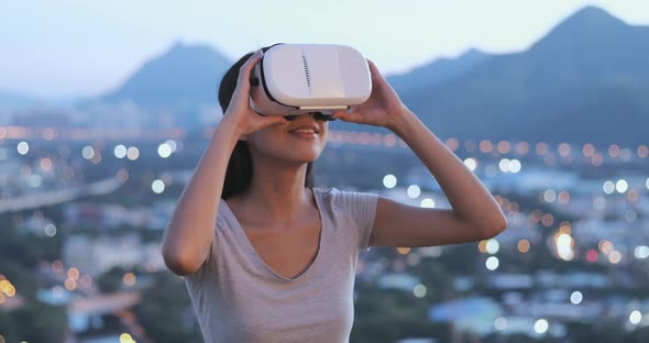 Woman watching with VR device 