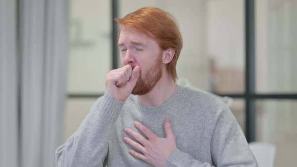 Portrait of Sick Young Redhead Man Coughing