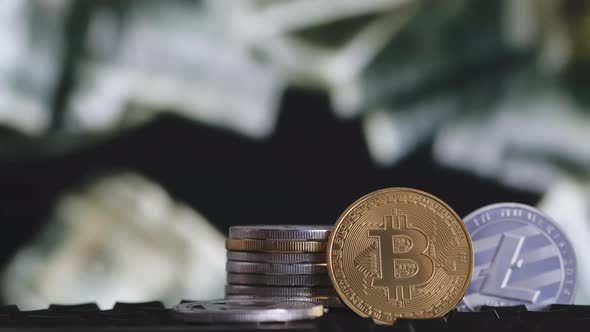 Cryptocurrency Bitcoin and Litecoin on Background of Falling Dollars