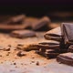 Broken Dark Chocolate Bars on Black Background Stack of Chocolate Pieces - VideoHive Item for Sale