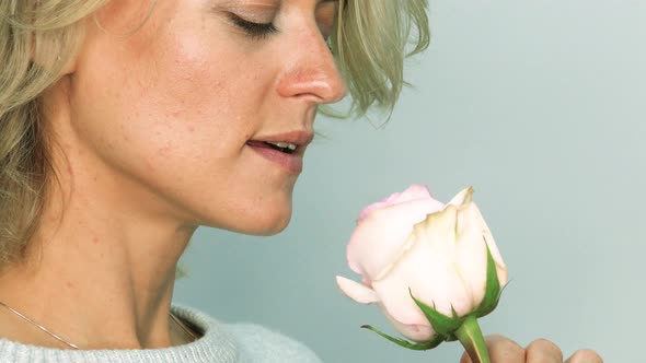 Woman with Pink Rose