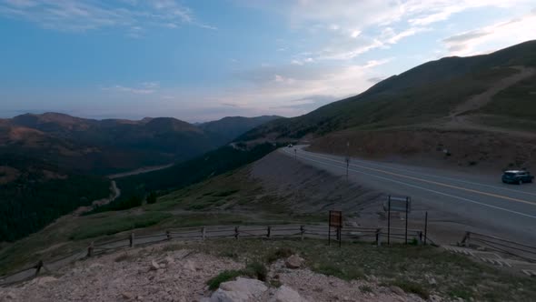 Rainstorm begins followed by sunrise over Colorado Rocky Mountains, Time lapse