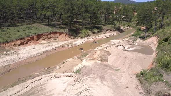 Narrow Muddy River Used for Sand Extracting Bird Eye View