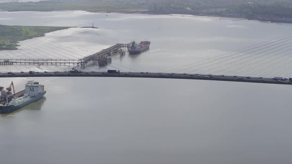 drone shot of Queen Elizabeth II Bridge , Dartford Thurrock River Crossing, high view of traffic