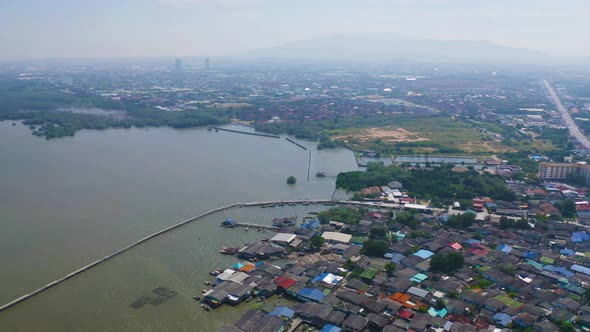 Aerial view of Ang Sila in Sri Racha district with sea, Chonburi skyline, Thailand. Urban city