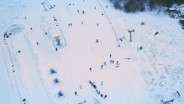 Skiers and Snowboarders Skiing on