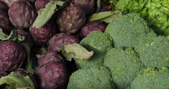 Fresh vegetables on stalls in a southern France market.