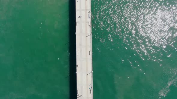 Aerial Top View of Huntington Pier, Beach and Coastline During Sunny Summer Day