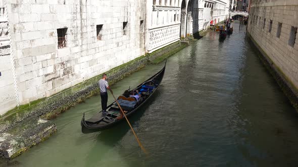 Gondolas Going in Canals in Venice Italy