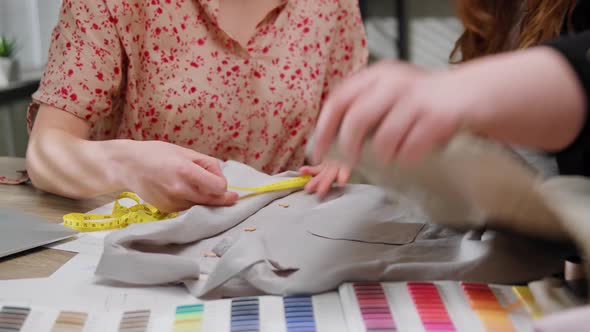 Young Female Fashion Designers Tailors Dressmakers Workings on New Custom Women Shirts Collection in