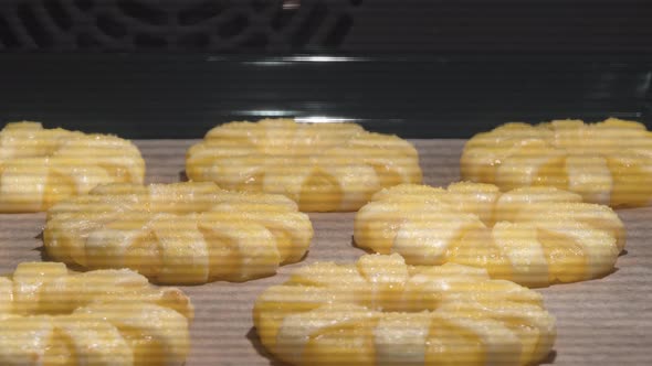 Time Lapse of Baking of Pineapple Puff Pastry Rings in Oven