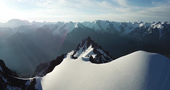 Rocky Mountain Peaks Covered with Snow. Shooting from A Drone, Top View