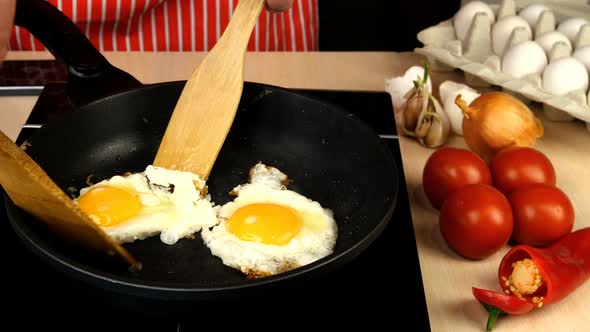 Turn Over Chicken Egg on Hot Skillet and Cooking Fried Eggs