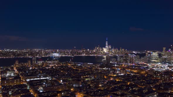 Urban Skyline of Lower Manhattan and Jersey City at Night