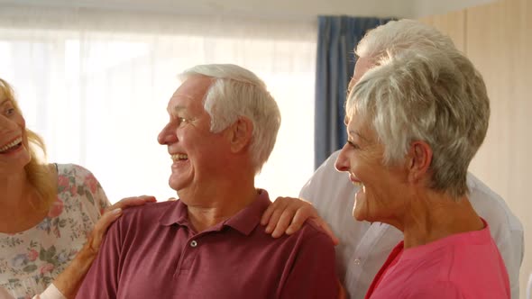 Happy senior friends spending time together